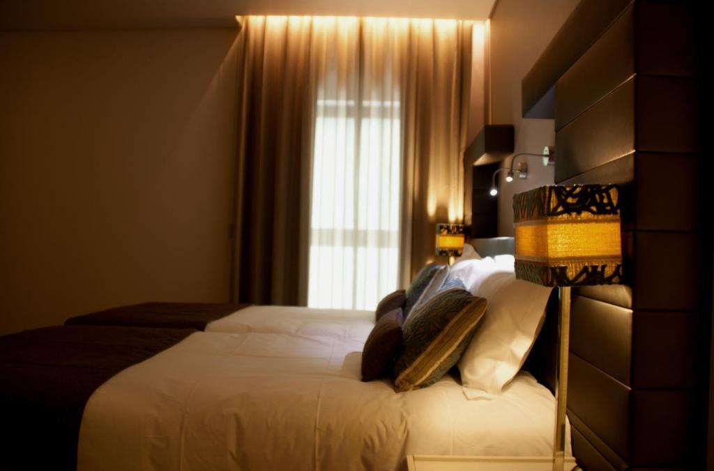 Aqua Ria Boutique Hotel Φάρο Δωμάτιο φωτογραφία