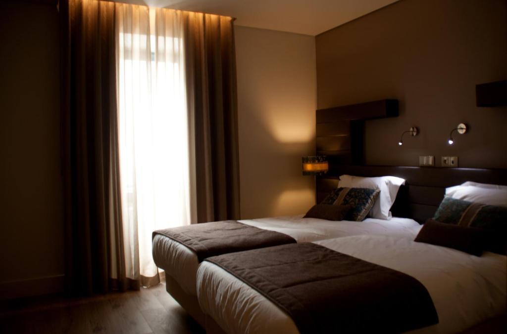 Aqua Ria Boutique Hotel Φάρο Δωμάτιο φωτογραφία