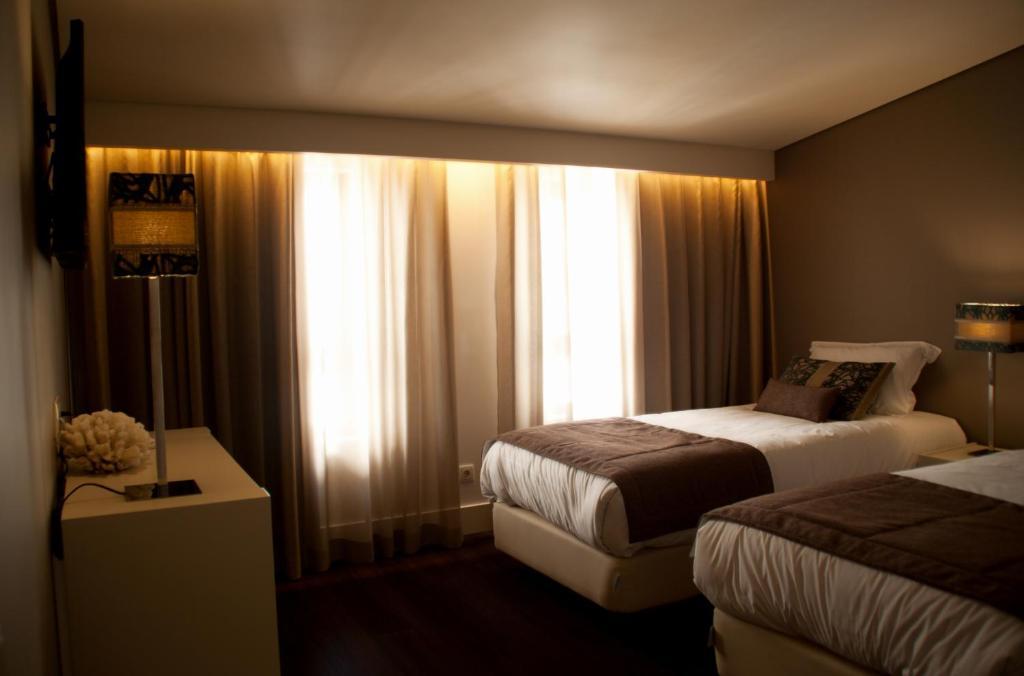 Aqua Ria Boutique Hotel Φάρο Δωμάτιο φωτογραφία