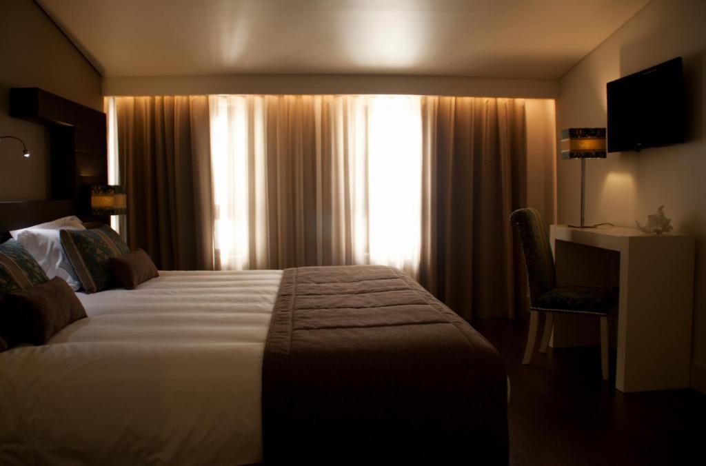 Aqua Ria Boutique Hotel Φάρο Δωμάτιο φωτογραφία